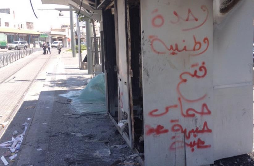 A damaged light-rail station in Shuafat. (photo credit: SETH J. FRANTZMAN)