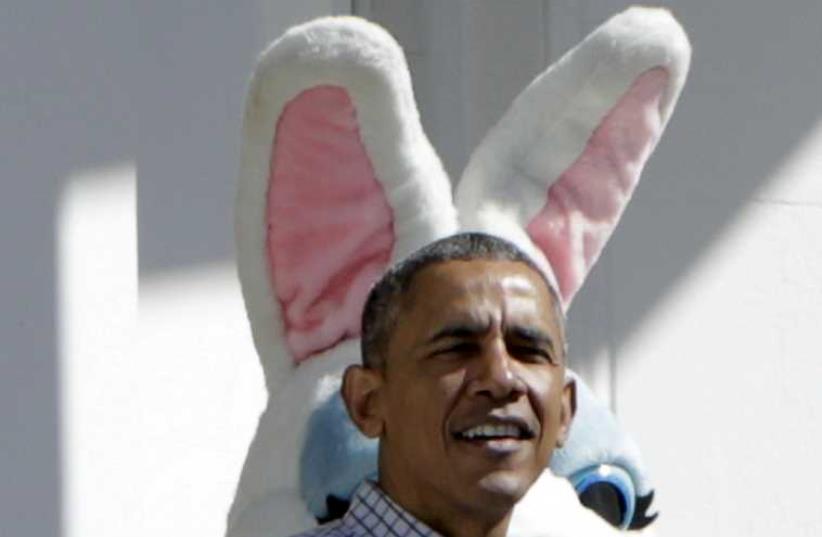 U.S. President Barack Obama greets participants before the annual White House Easter Egg Roll in Washington  (photo credit: REUTERS)