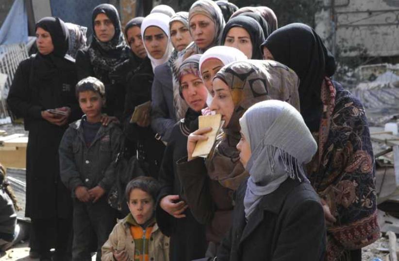 Yarmouk refugee camp  (photo credit: REUTERS/TAGHRID MOHAMMED/UNRWA)