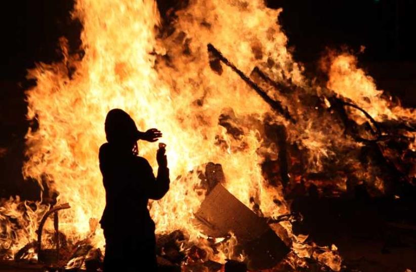 A bonfire seen on Lag Ba'omer (photo credit: MARC ISRAEL SELLEM/THE JERUSALEM POST)