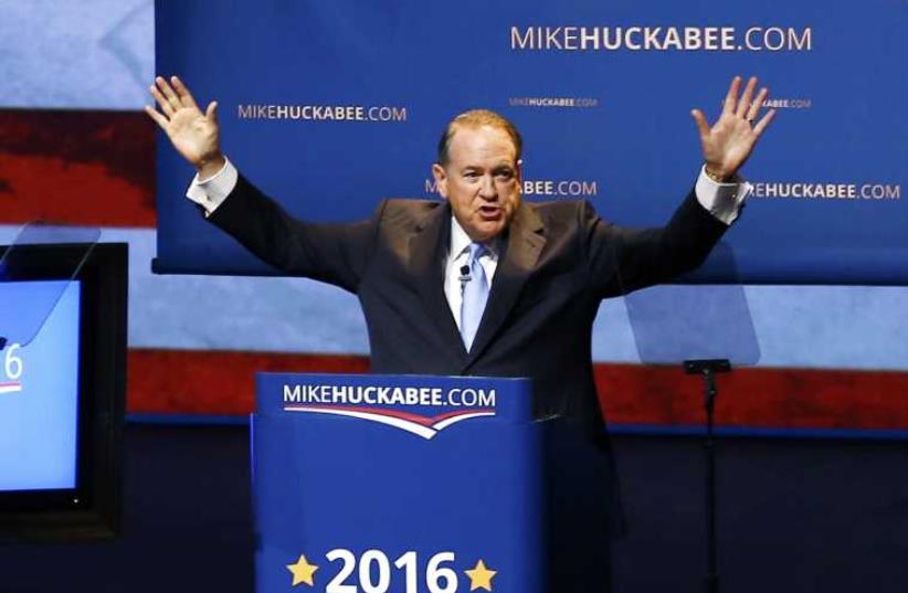 U.S. Republican presidential candidate and former Arkansas Governor Mike Huckabee addresses supporters as he formallly launches his bid for the 2016 Republican presidential nomination during an event in Hope, Arkansas May 5, 2015. (photo credit: REUTERS)