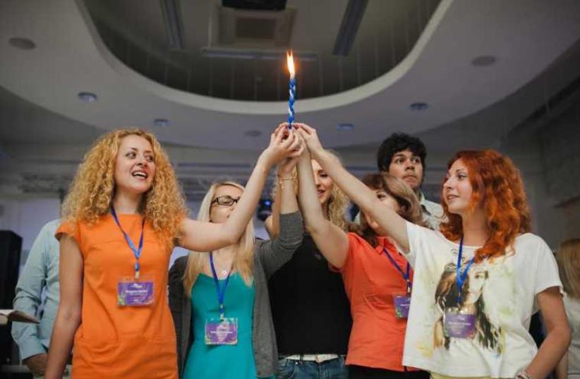 MOLDOVIAN JEWS celebrate Shabbat at Limmud FSU conference last year.  (photo credit: COURTESY LIMMUD FSU)