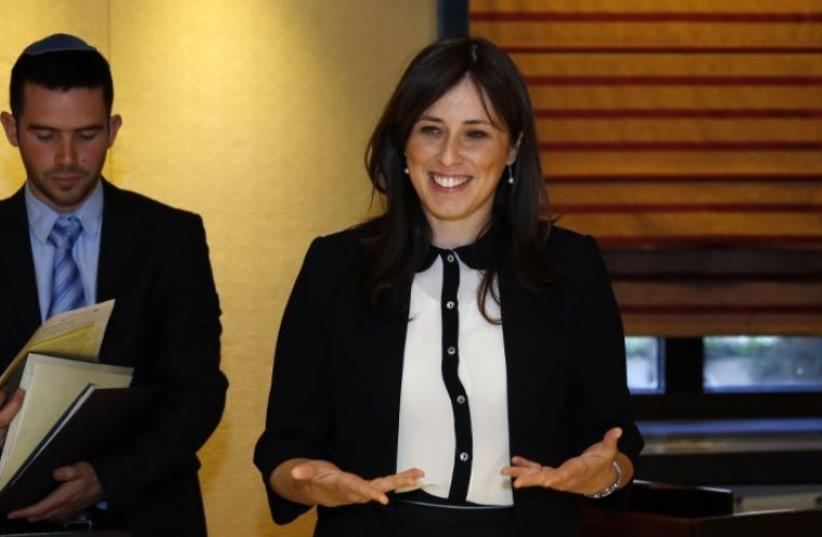 Deputy Foreign Minister Tzipi Hotovely (R) waits for European Union foreign policy chief Federica Mogherini ahead of a meeting at King David Hotel (photo credit: AFP PHOTO / GALI TIBBON)