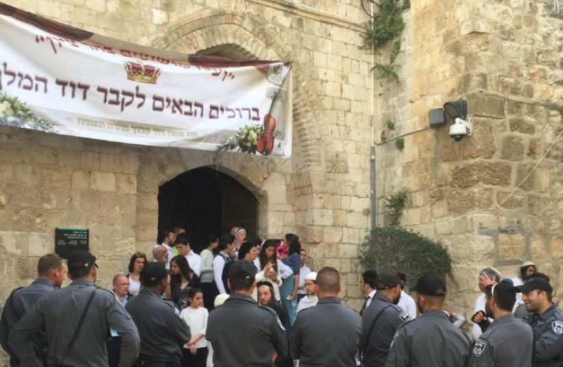 Protester's gather at King David’s tomb on Mount Zion last month to protest against Catholic use of the site on Pentacost. Recent years have seen tension over the area. (photo credit: SETH J. FRANTZMAN)