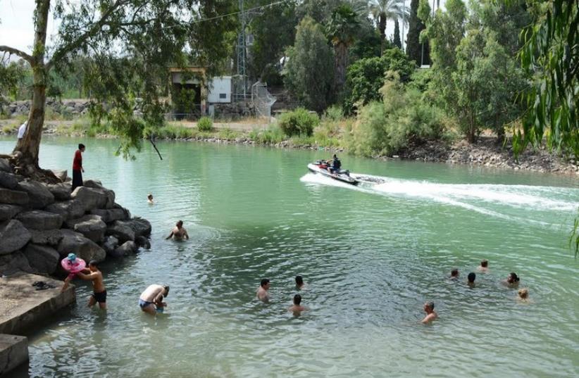 Swimming at the mouth of the Jordon River last week (photo credit: SARAH LEVIN)