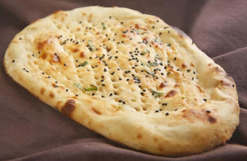 Indian naan bread (photo credit: INGIMAGE)