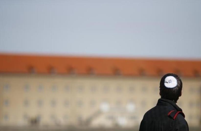 A Jewish man visits the Nazi concentration camp of Buchenwald (photo credit: REUTERS)