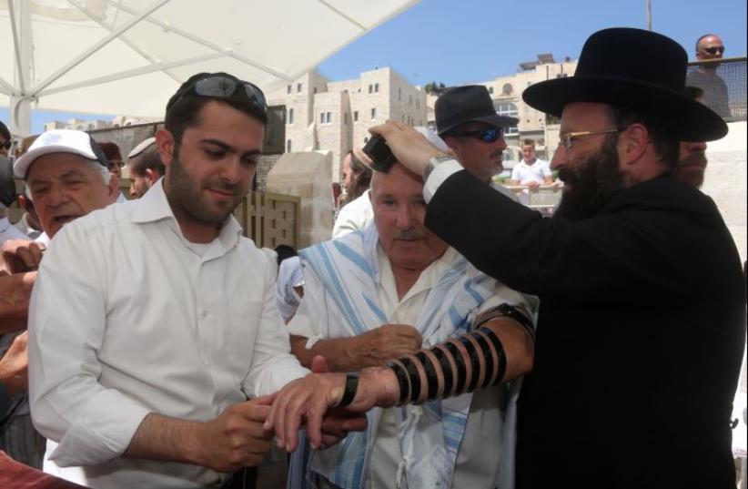 Late Bar-Mitzva for Holocaust survivors at the Western Wall (photo credit: MARC ISRAEL SELLEM/THE JERUSALEM POST)