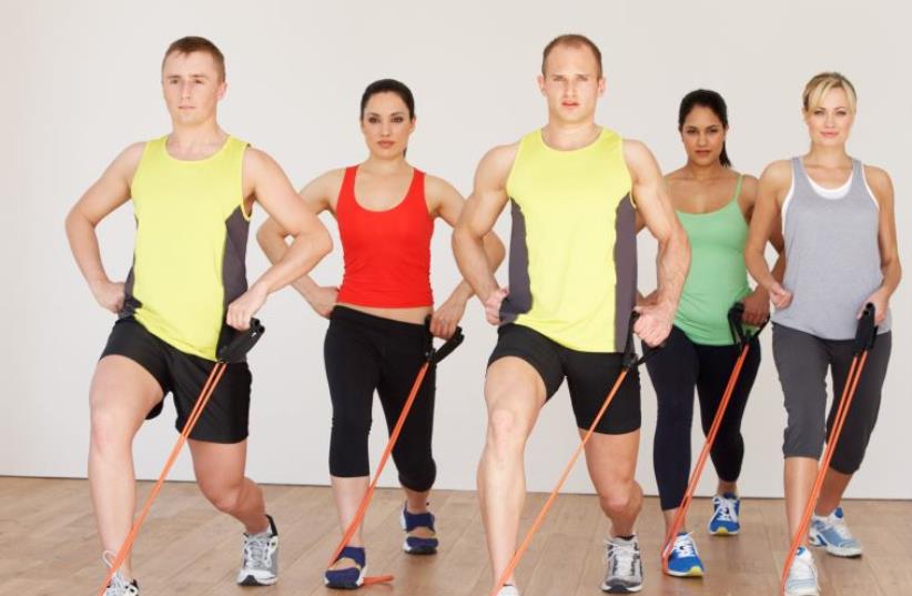 Group exercise at a gym [Illustrative] (photo credit: INGIMAGE)