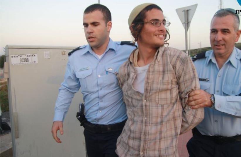 Police arrest Meir Ettinger (photo credit: TAZPIT)