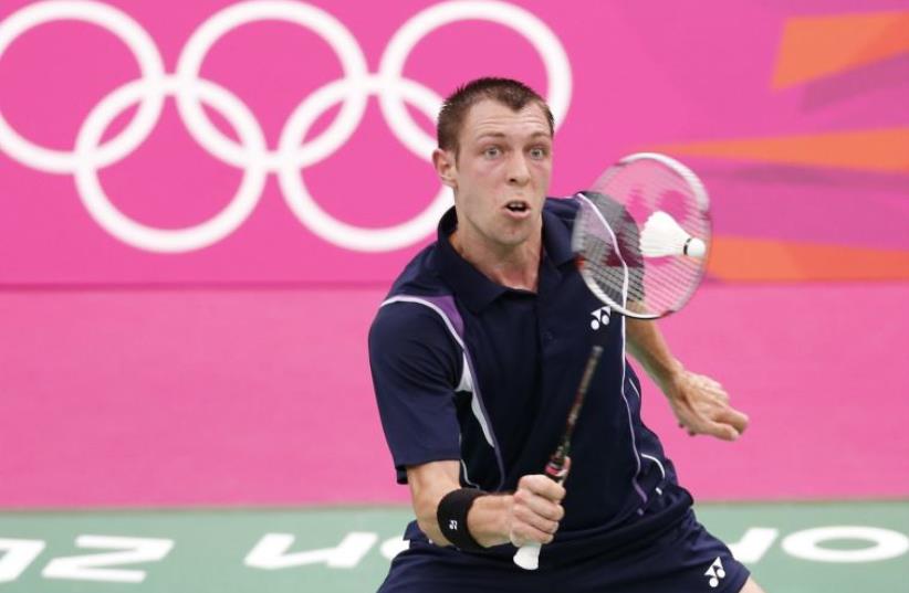 Israel's Misha Zilberman plays against Denmark's Jan O Jorgensen during their men's singles group play stage badminton match at the Wembley Arena during the London 2012 Olympic Games (photo credit: REUTERS)