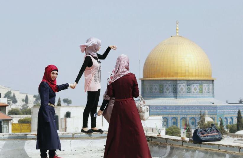 ‘WITH EDUCATION, women grow wings and fly.’ (photo credit: REUTERS)