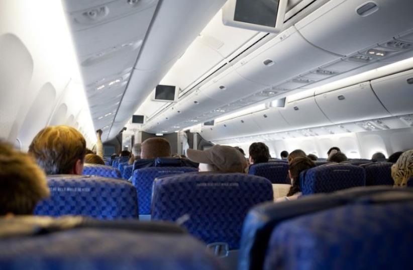 Interior of a passenger airplane (photo credit: INGIMAGE)