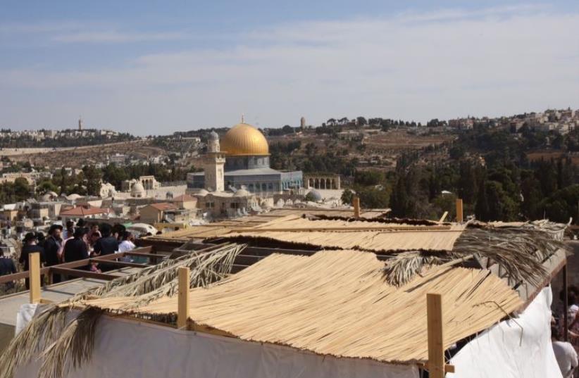 A succa in Western Wall (photo credit: MARC ISRAEL SELLEM/THE JERUSALEM POST)