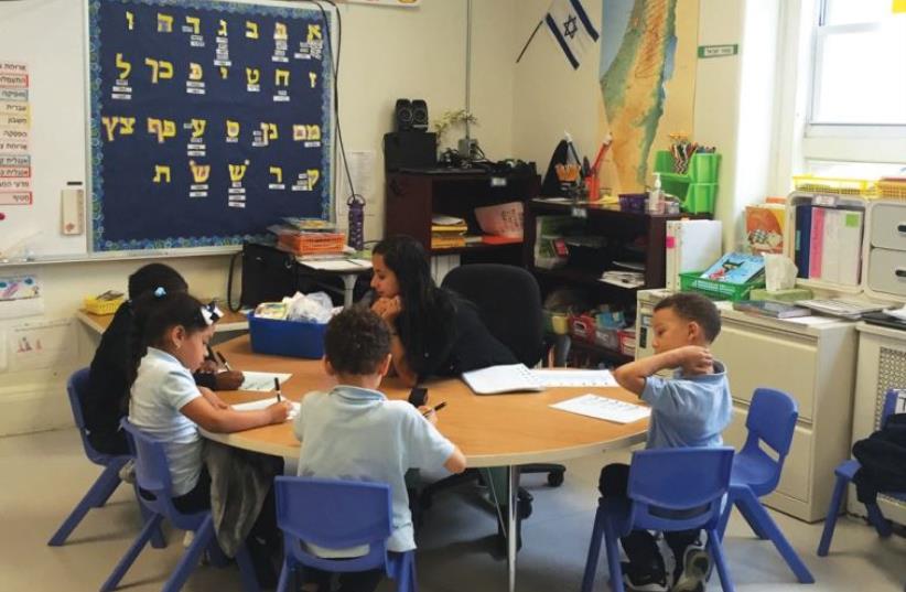 YOUNG STUDENTS of all backgrounds are studying Hebrew and Israeli culture in New York’s Harlem neighborhood. (photo credit: DANIELLE ZIRI)