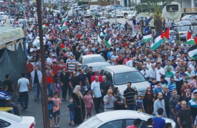 DEMONSTRATORS GATHER in Sakhnin, October 13, 2015 (photo credit: JOINT ARAB LIST)