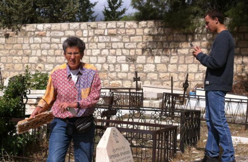 Interfaith delegation cleans Mount Zion graves (photo credit: Courtesy)