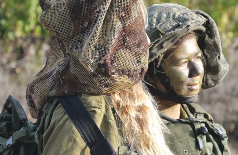 The IDF's new coed combat units are the result of a long struggle for the integration of women into fighting roles in the army (photo credit: SETH J. FRANTZMAN)