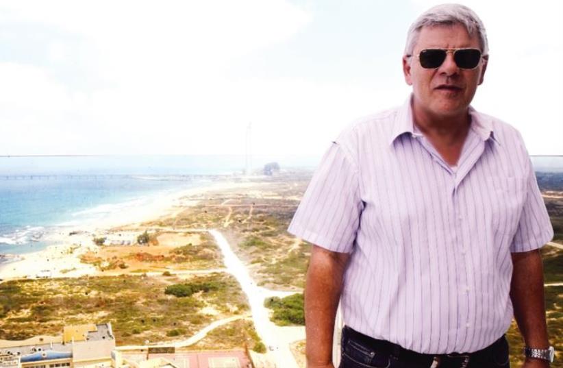 Hadera Mayor Tzvika Gendelman on a seaside balcony (photo credit: Courtesy)