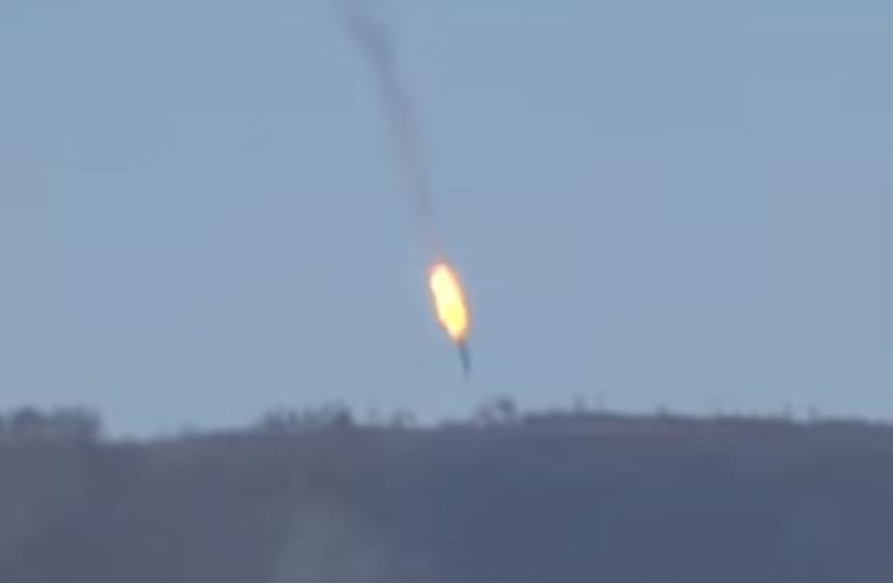 Screenshot from video purporting to show Turkish F-16s shooting down warplane‏ (photo credit: screenshot)