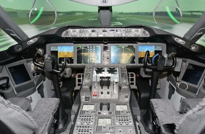 The Boeing 787 Dreamliner Engineering flight deck simulator is shown during a media tour of Boeing Co (photo credit: REUTERS)