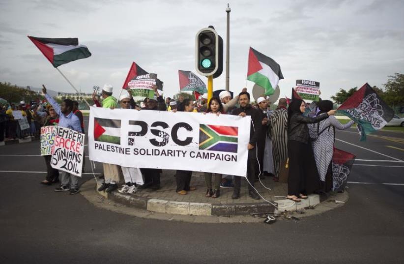 Supporters of the Boycott, Divestment and Sanctions (BDS) campaign protest in Cape Town [File] (photo credit: RODGER BOSCH/AFP)