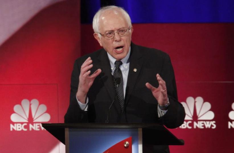 Democratic US presidential candidate and US Senator Bernie Sanders speaks at the NBC News - YouTube Democratic presidential candidates debate (photo credit: REUTERS)