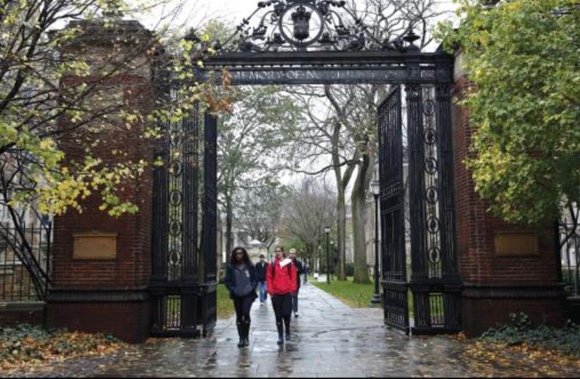 STUDENTS WALK on the campus of a university in Connecticut (photo credit: REUTERS)