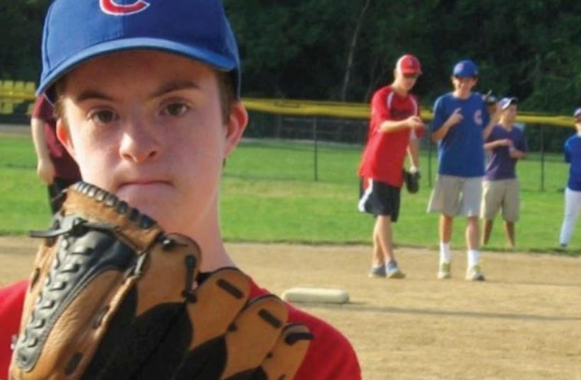 Buddy Baseball matches ‘buddies’ with special-needs children to provide a memorable experience for both. The first game in Jerusalem is later this month at Kraft Stadium. (photo credit: KESHET BUDDY BASEBALL/COURTESY)