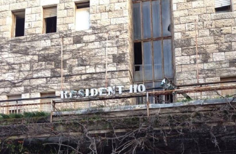 The site of the former President Hotel on Ahad Ha’am Street. In a comic twist, the derelict sign now reads ‘Resident Ho.’ (photo credit: ERICA SCHACHNE)