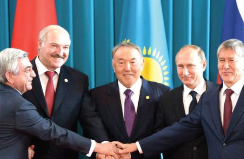 MEETING OF (from left to right) President Serzh Sargsyan of Armenia, President Alexander Lukashenko of Belarus, President Nursultan Nazarbayev of Kazakhstan, President Vladimir Putin of Russia and President Almazbek Atambayev of Kyrgyz Republic. (photo credit: Courtesy)