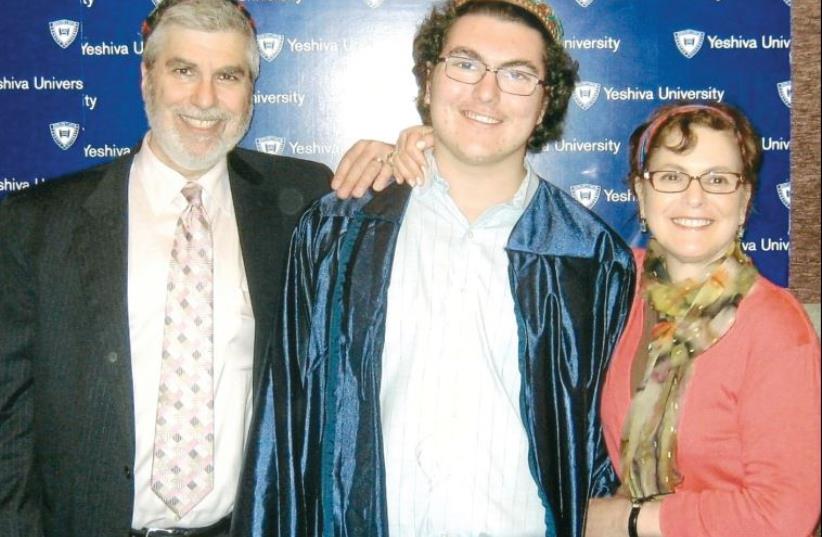 Mark and Ellen Newman with Ariel at his high-school graduation, a few months before his death (photo credit: Courtesy)