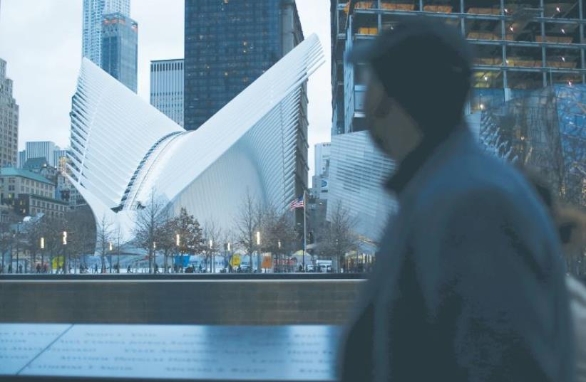 9/11 GROUND ZERO today includes numerous skyscrapers and the recently opened World Trade Center Transportation Hub designed by Santiago Calatrava. (photo credit: REUTERS)