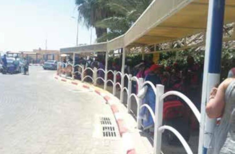 TOURISTS WAIT to enter Sinai at the Eilat-Taba border crossing (photo credit: LAURA KELLY)