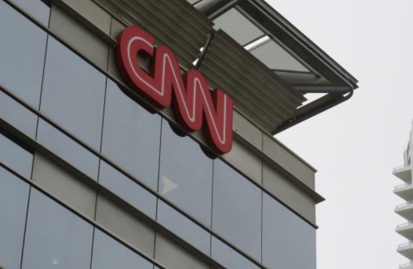 The CNN building (L) in Dubai Media City Park March 17, 2016. (photo credit: REUTERS/RUSSELL BOYCE)