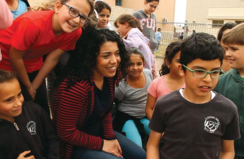 Wafa Hussein,a Muslim elementary school teacher of English and Arabic in a Jewish school in Safed who is loved by her Jewish students and strives for coexistence (photo credit: IGAL HECHT)