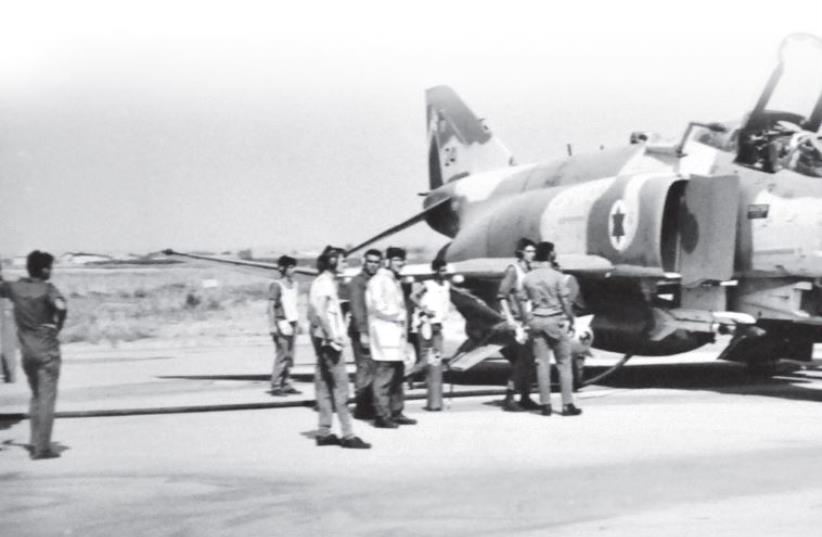 Pilots gather before takeoff and the start of Operation Mole Cricket 19, in June 1982 (photo credit: COURTESY AVI BARBER)