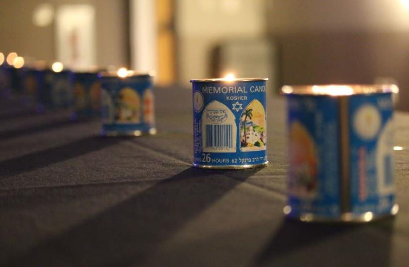 In honor of the Pulse shooting victims, Yizkor candles adorn a table in the Rosen Jewish Community Center in Orlando on Wednesday, June 22. (photo credit: SHANA MEDEL)