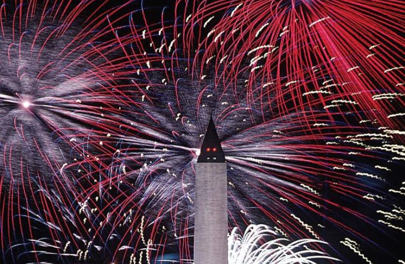 An American Independence Day fireworks display at the Washington Monument (photo credit: Wikimedia Commons)