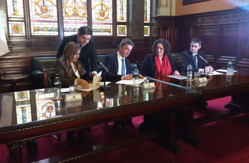 Agreement signing between Uruguay's parliament and the Knesset (photo credit: Courtesy)