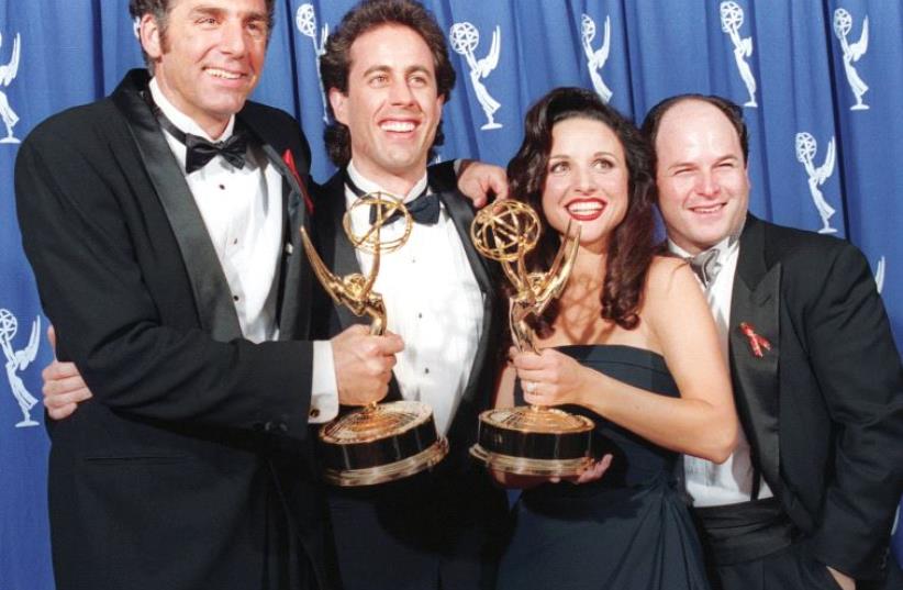 The cast of the NBC TV series Seinfeld pose together in 1993 (photo credit: REUTERS)