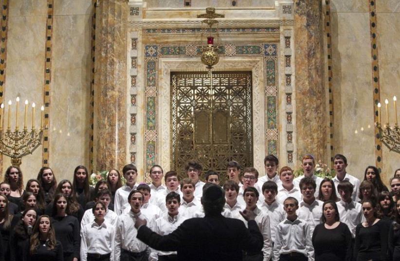 HaZamir International Jewish High School Choir sings at the Temple Emanu-El during the annual Holocaust Remembrance Day in New York April 7, 2013 (photo credit: REUTERS)