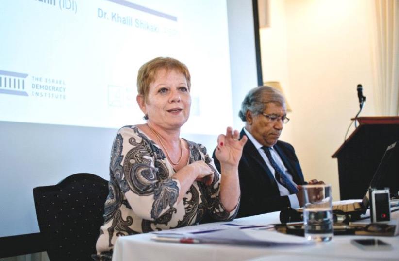 PROF. TAMAR HERMANN and Dr. Khalil Shikaki speak at this week’s press conference about a poll carried out by the Israel Democracy Institute and sponsored in part by the European Union. (photo credit: KONRAD-ADENAUER-STIFTUNG)