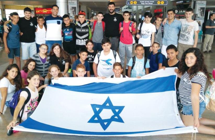 Druze children preparing to depart from Ben-Gurion International Airport (photo credit: IDF WIDOWS AND ORPHANS ORGANIZATION)