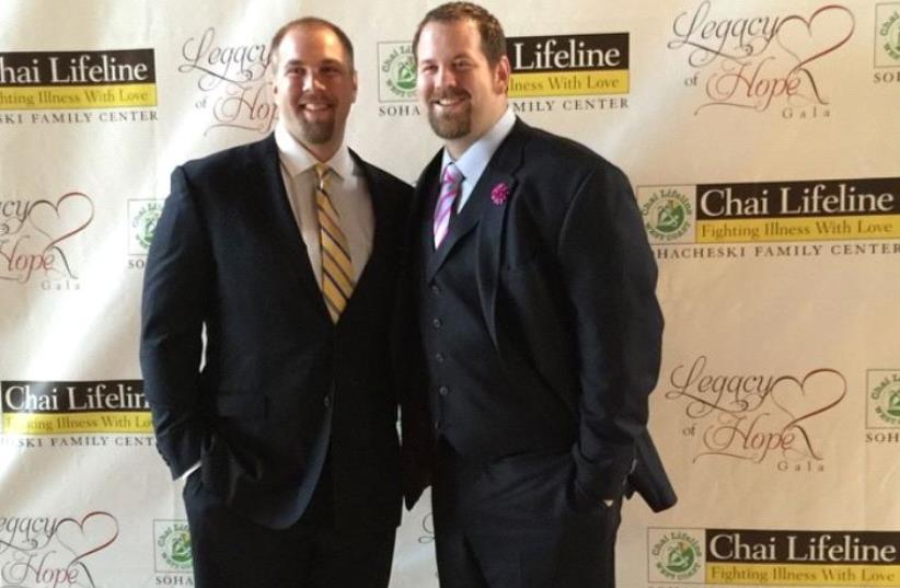 Mitch (R) and Geoff Schwartz (photo credit: FACEBOOK)