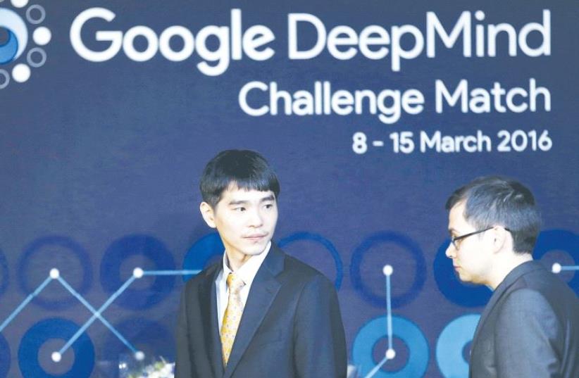 THE WORLD’S top Go player, Lee Sedol, and Demis Hassabis, the CEO of DeepMind Technologies and developer of AlphaGO, arrive at an award ceremony for the Google DeepMind Challenge Match against Google’s artificial intelligence program AlphaGo in Seoul, South Korea, in March. (photo credit: REUTERS)