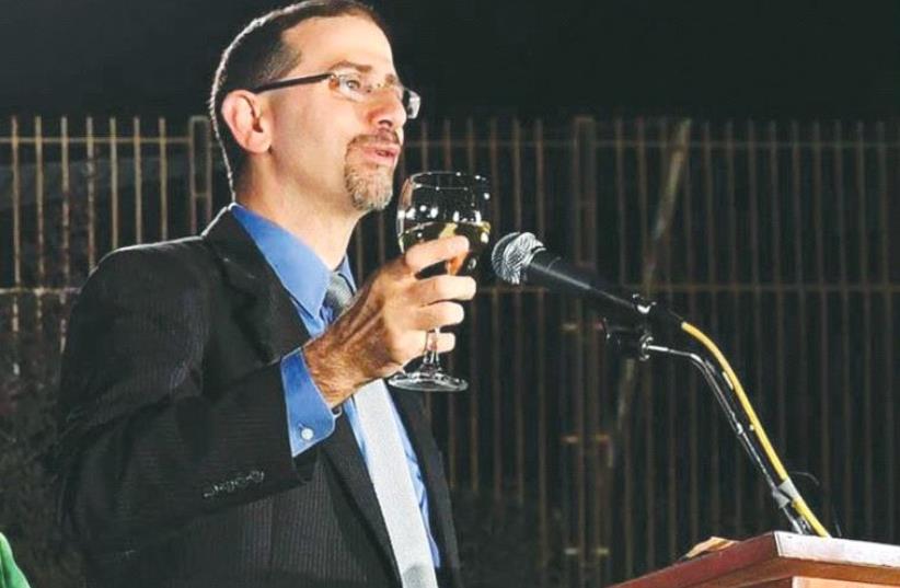 US AMBASSADOR Dan Shapiro toasts the New Year. (photo credit: FACEBOOK)