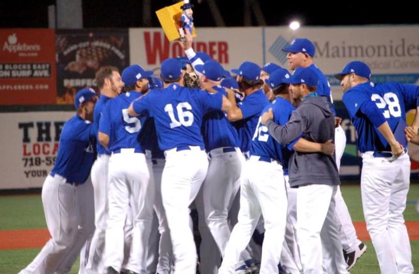 Israel belts Great Britain advances to World Baseball Classic (photo credit: JOSH SOLOMON)