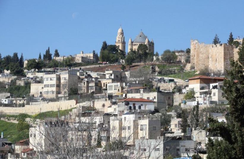 Homes in the eastern Jerusalem neighborhood of Silwan, pictured above (photo credit: MARC ISRAEL SELLEM)