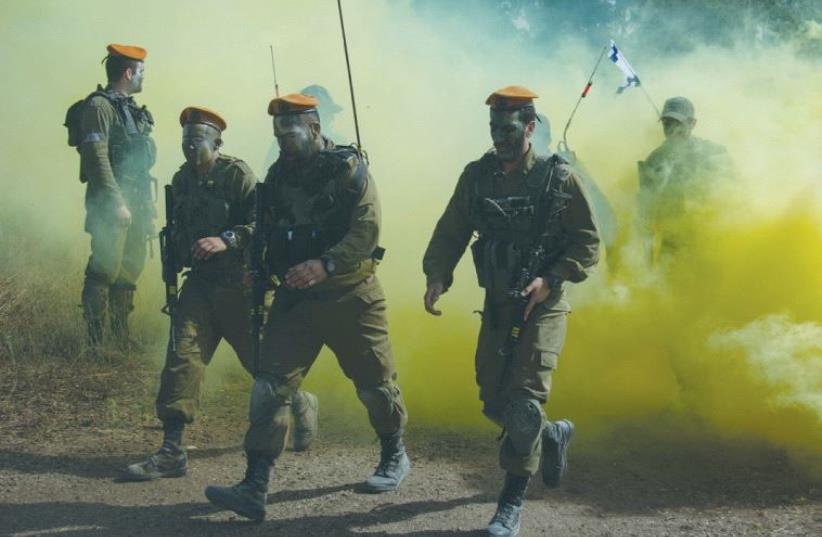 OME FRONT COMMAND soldiers take part in a rescue training exercise. (photo credit: IDF)